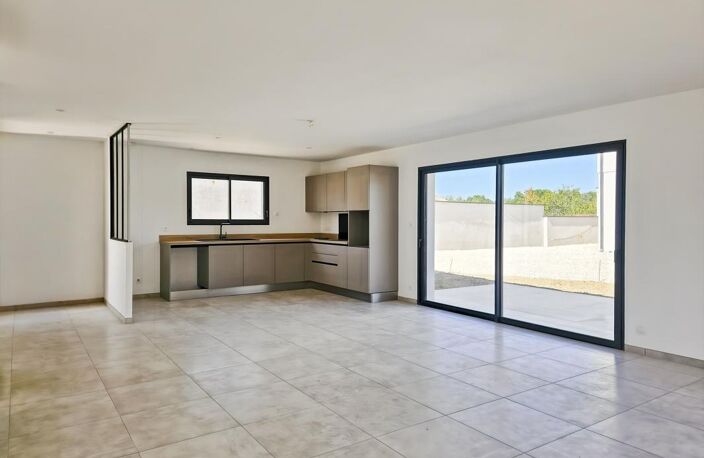 Maison neuve avec garage et jardin — photo 2