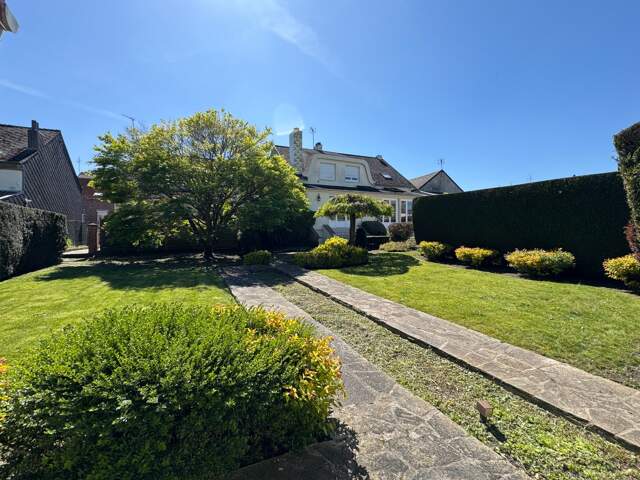   Élégante maison semi-individuelle – Centre-ville de Fourmies – 159 m² – Jardin arboré – Garage 45 m² — photo du bien