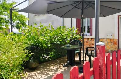 Maison lumineuse avec terrasse, vue dégagée et garage — photo du bien
