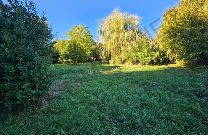 TERRAIN A BATIR 1400M² PARC NOMBREUX ARBRES — photo 2