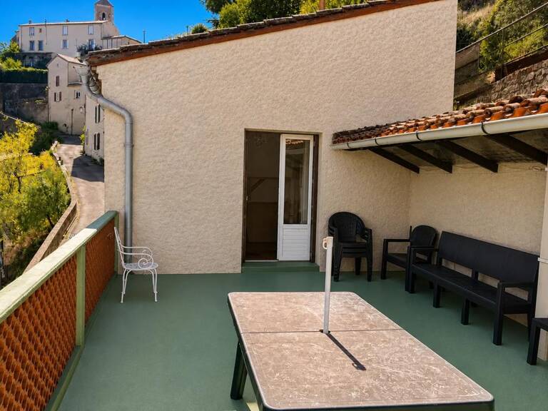 Maison de 5 pièces  à Lastours avec terrasse et jardinet.
Vue panoramique — photo 1