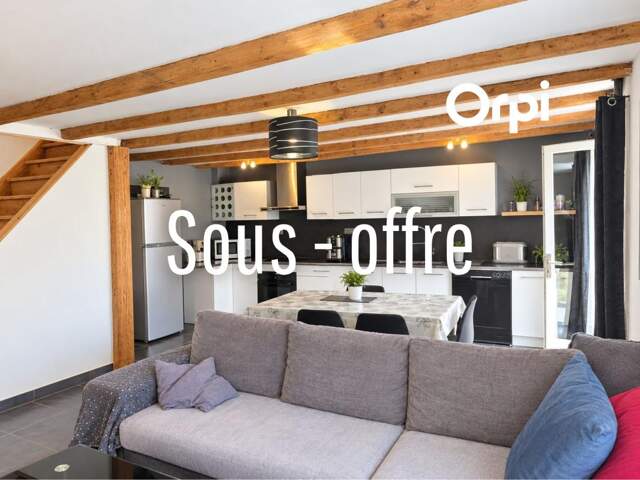 Maison mitoyenne T4 avec garage, terrasse et terrain — photo du bien