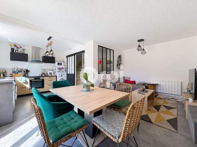 À Vendre Appartement duplex avec jardin privatif, 3 chambres et garage — photo du bien