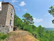TOUR EN PIERRES AMENAGEE AVEC TERRAIN DE 7 HECTARES ET VUE PANORAMIQUE SUR LA VALLEE DE LA SIAGNE — photo 3