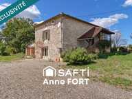 Maison ancienne en pierre de 65 m² avec deux chambres, garage, cave et jardin arboré — photo 3