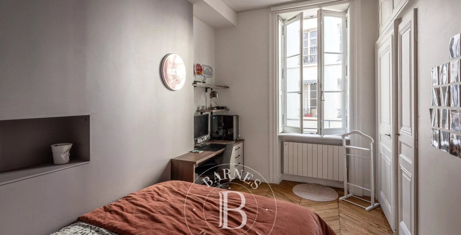Lyon 1er – Rue Longue – Appartement de caractère de 117,35 m² avec cave et deux greniers — photo 1