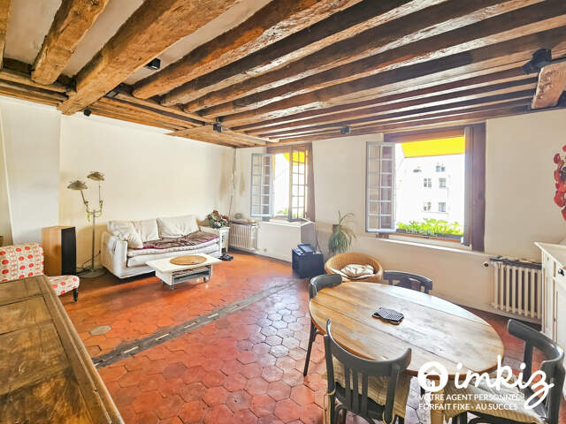 Duplex atypique en dernier étage — photo du bien