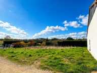 Terrain au calme, en retrait de la route — photo 2