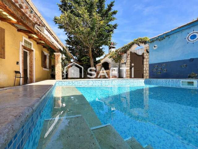 Maison de plain pied avec piscine et dépendance — photo du bien