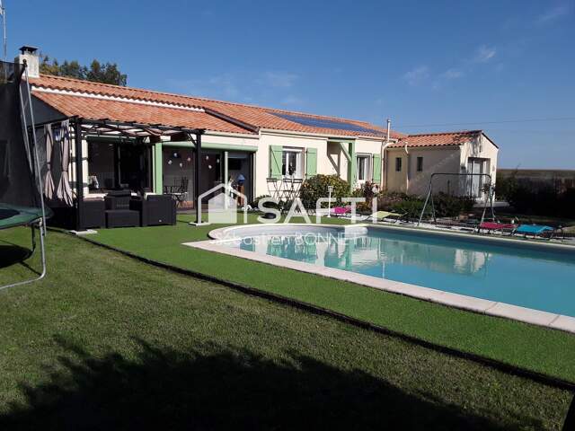 Maison plain pied 3 chambres avec deux garages et piscine — photo du bien