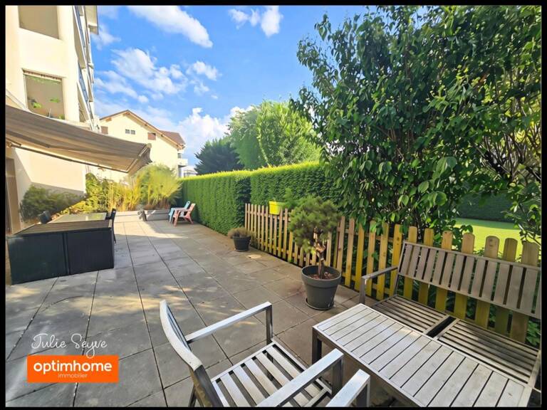 T3 Cessy centre en rez-de-jardin avec terrasse de 57 m², garage, cave et parking — photo 1