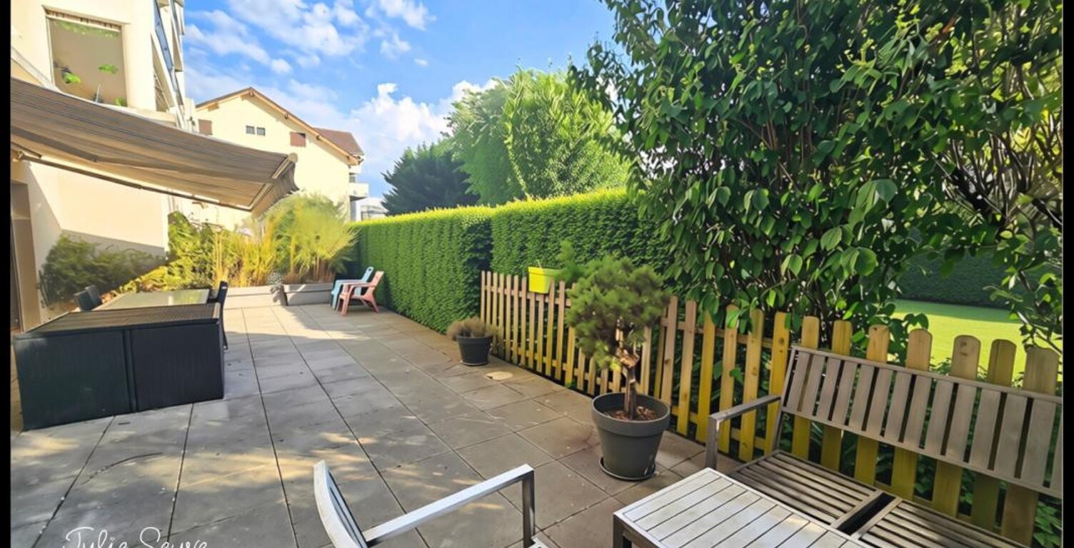 T3 Cessy centre en rez-de-jardin avec terrasse de 57 m², garage, cave et parking — photo 1