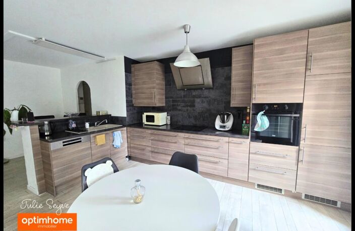 T3 Cessy centre en rez-de-jardin avec terrasse de 57 m², garage, cave et parking — photo 3