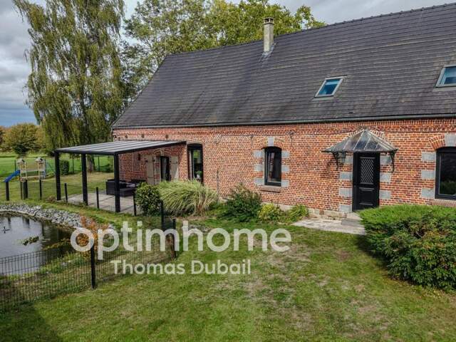 Maison atypique avec beaux volumes sur 2 000 m² de terrain — photo du bien