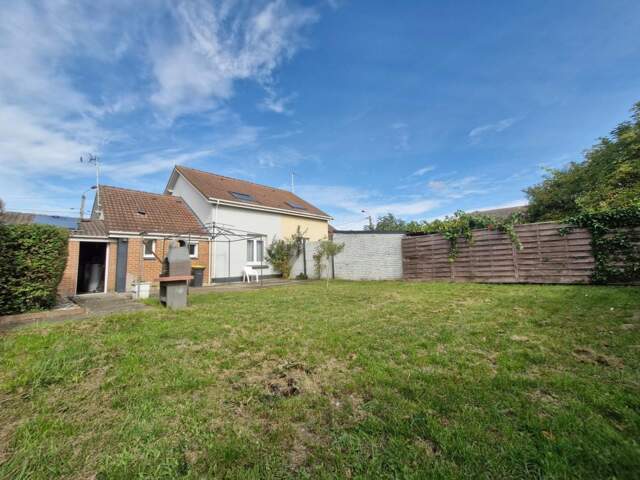 Maison semi-individuelle avec jardin, garage et potentiel semi-plain-pied — photo du bien