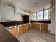 À LOUER – Appartement rénové 91,5 m² avec balcon, 3 chambres et stationnement – Centre-ville de Rive-de-Gier — photo 4