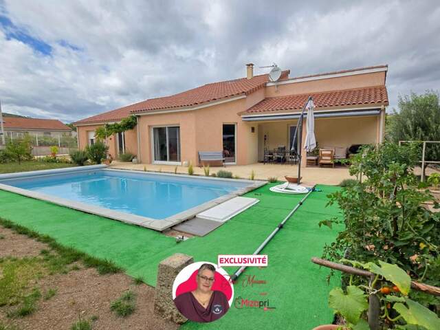 Maison individuelle en plain-pied de 184 m² avec jardin, garage et piscine — photo du bien