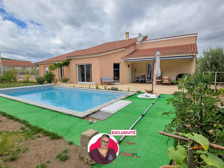 Maison individuelle en plain-pied de 184 m² avec jardin, garage et piscine — photo 1