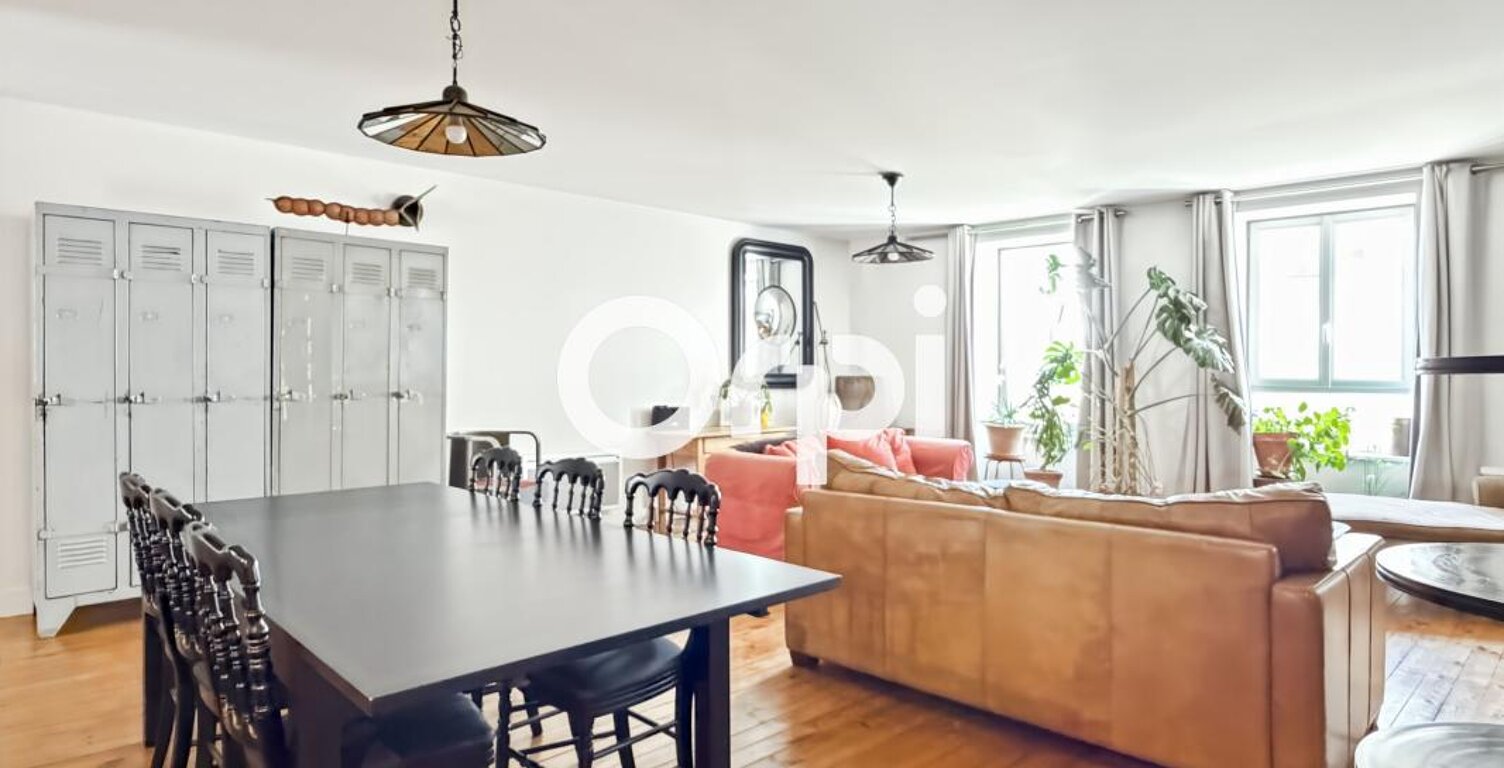Saint-Martin-en-Haut centre : appartement T5 de 160 m² rénové avec 4 chambres et suite parentale   — photo 1