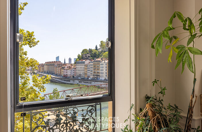 Appartement à l'élégance architecturale suspendue sur la Saône — photo 5