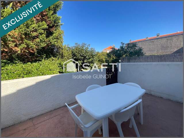 Appartement 1 chambre avec terrasse et parking sécurisé — photo du bien