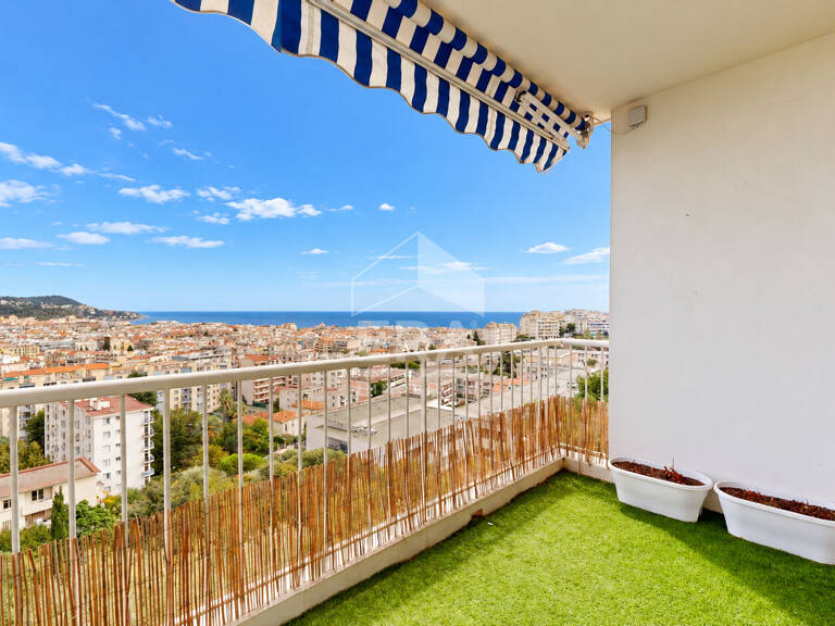NICE - PARC IMPÉRIAL : JOLI 3 PIÈCES TRAVERSANT AVEC TERRASSE ET BALCON, BÉNÉFICIANT D'UNE VUE DÉGAGÉE SUR LA VILLE ET LA MER — photo 1
