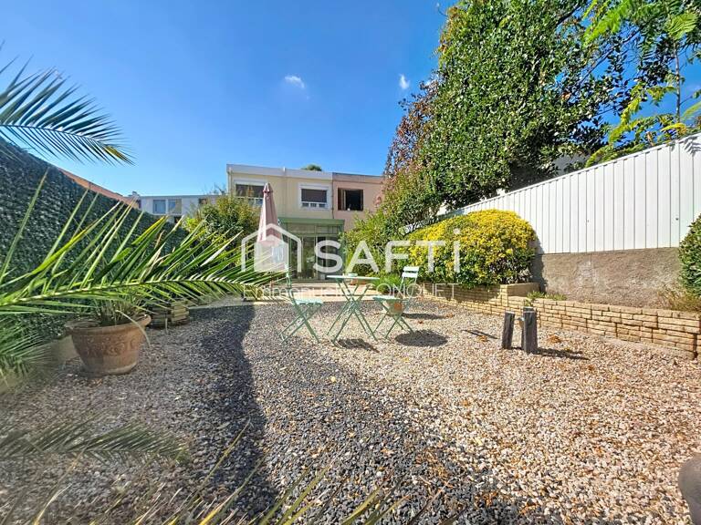Maison 4 chambres de 113 m² avec garage et jardin — photo 1