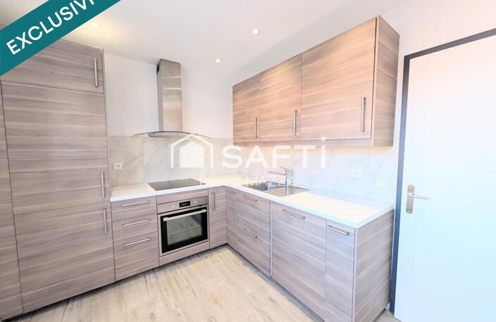 En plein centre, 4p de 80m² au dernier étage avec ascenseur, 2 chambres et balcon côté sud, cave et parking couvert sous/sol — photo 4