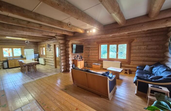   EXCLUSIVITÉ – Authentique maison en rondins massifs avec terrain clos de 37 ares A VANGENBOURG ENGENTHAL — photo 2