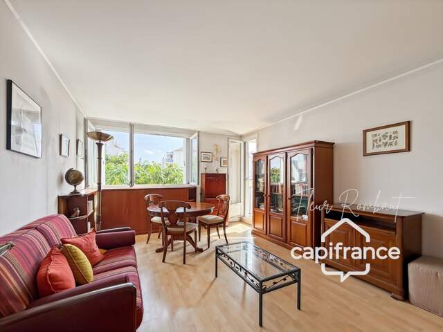 Appartement 2 pièces lumineux avec loggia, balcon, cave et parking proche gare — photo du bien