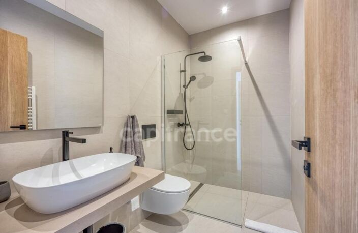 Appartement T3 de 68m² en rez de jardin -  BRENTHONNE (74) — photo 4