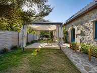 Bâtisse en pierre de 86 m², avec véranda, garage et joli jardin de 741 m² avec piscine hors-sol — photo 2