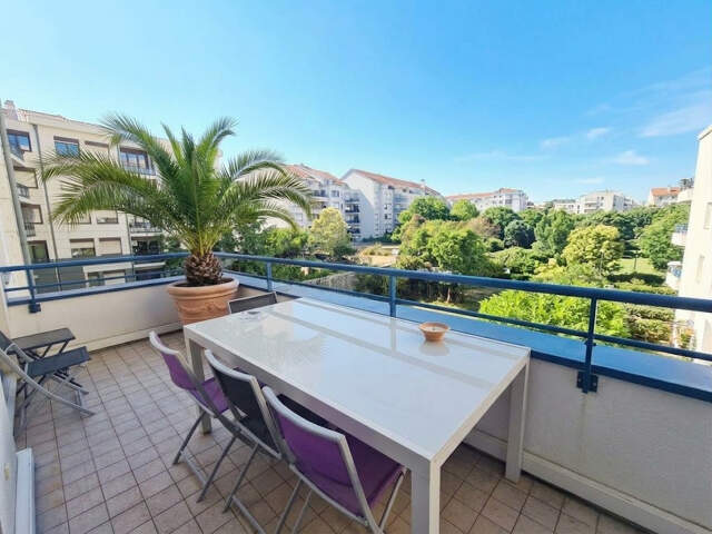 Appartement T4Bbis de 138M² - Gratte ciel - terrasse, loggia, garage fermé — photo du bien
