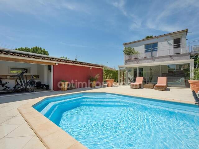 LUNEL (34400) – MAISON INDIVIDUELLE – 4 CHAMBRES – PISCINE CHAUFFÉE – TERRASSE – 2 LOGEMENTS – GARAGE — photo du bien