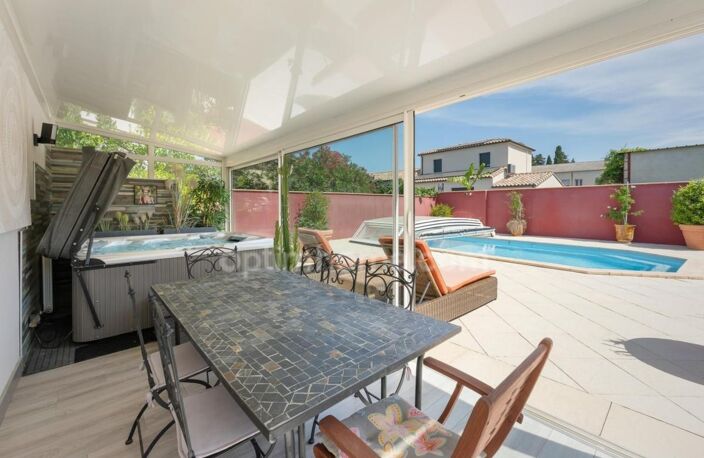 LUNEL (34400) – MAISON INDIVIDUELLE – 4 CHAMBRES – PISCINE CHAUFFÉE – TERRASSE – 2 LOGEMENTS – GARAGE — photo 4