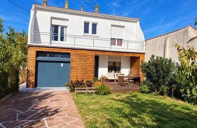 Maison individuelle avec jardin et garage proche centre-ville — photo du bien