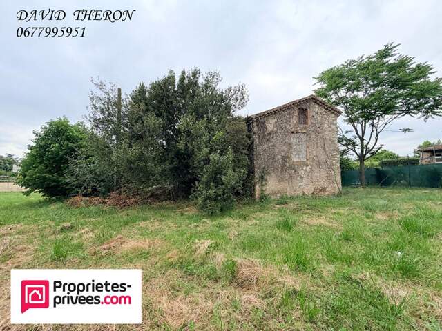 TERRAIN 1400 M2  + MAS — photo du bien
