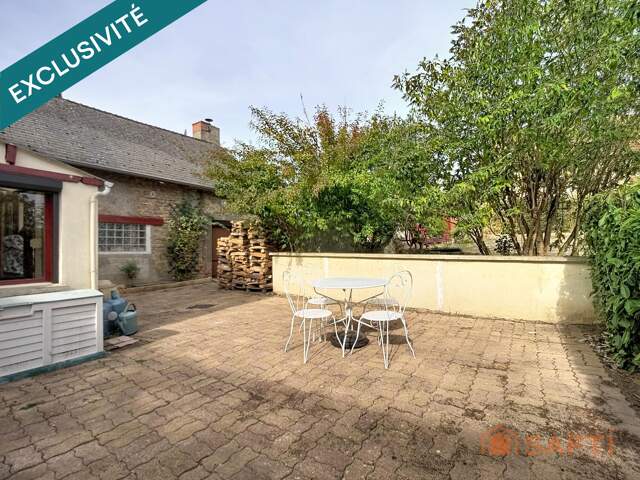 Maison en pierre avec dépendances et jardin clos — photo du bien