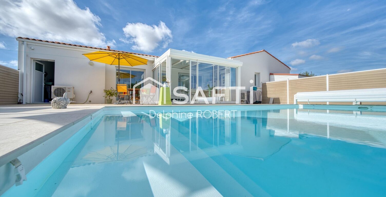 Plain-pied contemporain avec piscine aux prestations soignées — photo 1