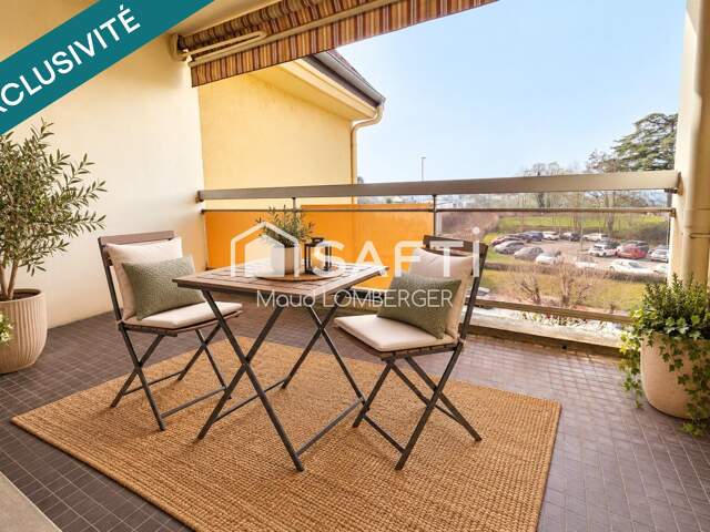 Appartement F3 - Résidence Charles Quint avec ascenseur, terrasse et garage. — photo du bien
