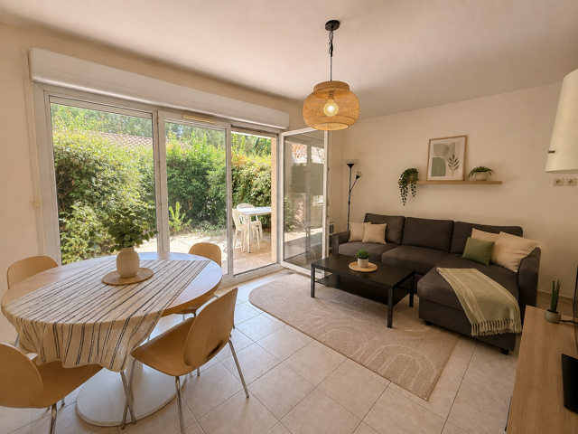 Appartement P3 en rez de jardin avec parking fermé — photo du bien