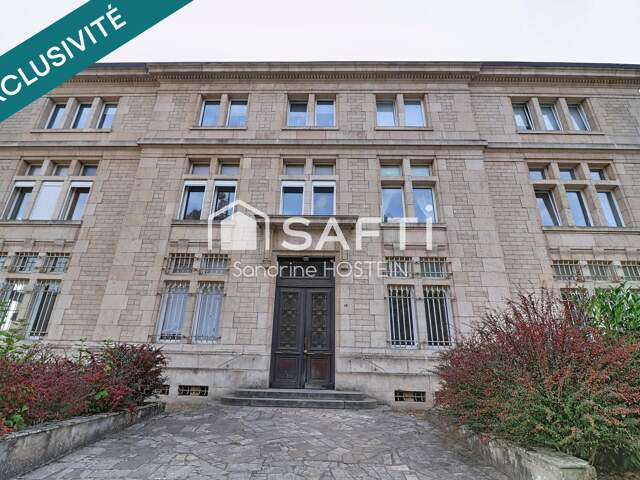 Appartement de 60m2 avec 1 chambre, garage et cave privée. — photo du bien