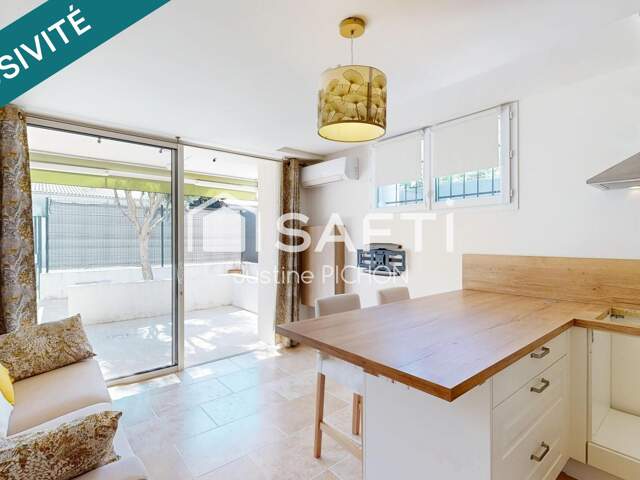 Appartement T2, en rez-de-jardin, deux places de stationnement privative — photo du bien