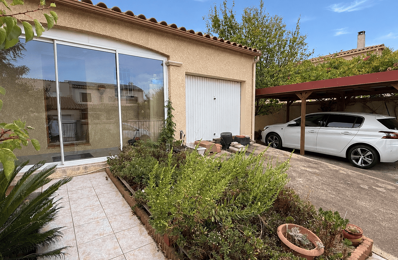 Maison 4 faces de plain-pied avec jardin, véranda et panneaux solaires — photo du bien
