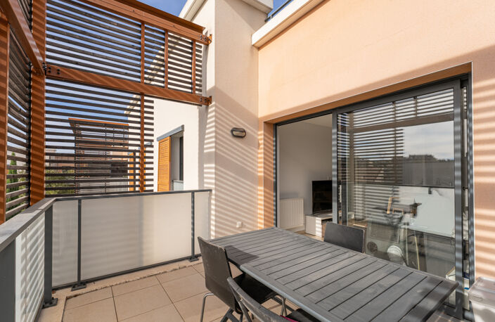 AIX LA DURANNE - T2 TERRASSE - PLACE DE PARKING EN SOUS-SOL — photo 5