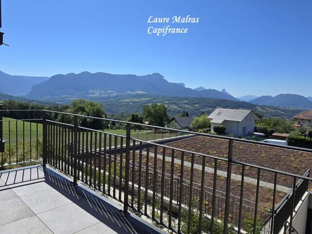 GROISY – A vendre beau T2 avec balcon, vue montagnes, cave, 2 stationnements privatifs — photo du bien