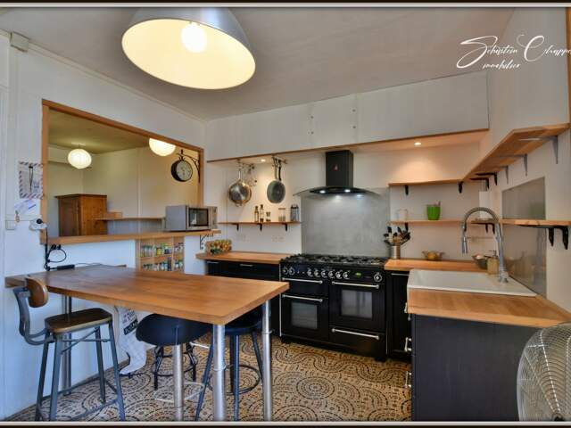 CAUX – MAISON DE VILLAGE AVEC GARAGE, ATELIER ET TERRASSE — photo du bien