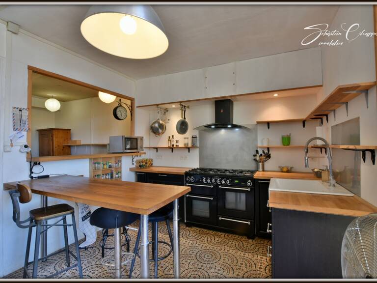 CAUX – MAISON DE VILLAGE AVEC GARAGE, ATELIER ET TERRASSE — photo 1