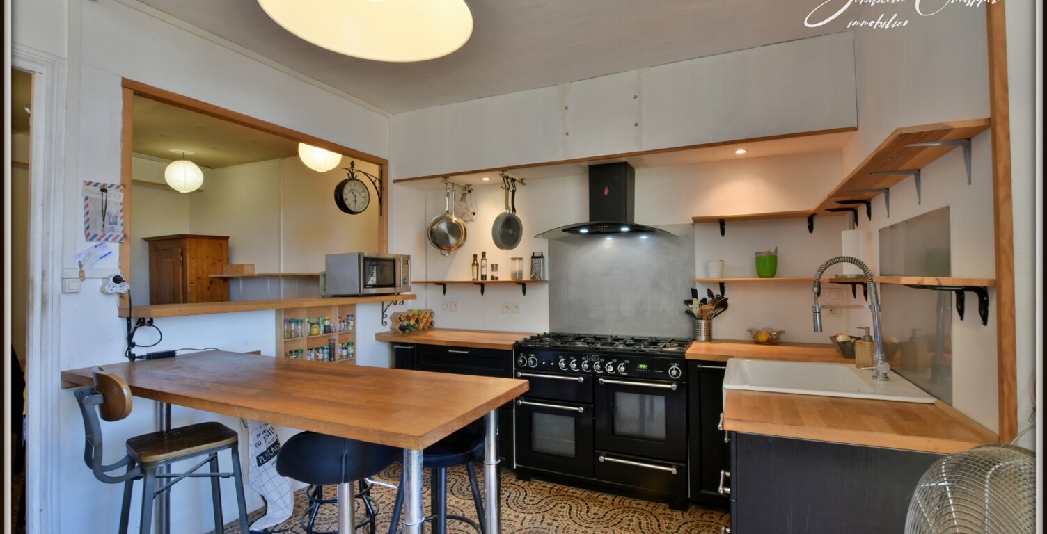 CAUX – MAISON DE VILLAGE AVEC GARAGE, ATELIER ET TERRASSE — photo 1