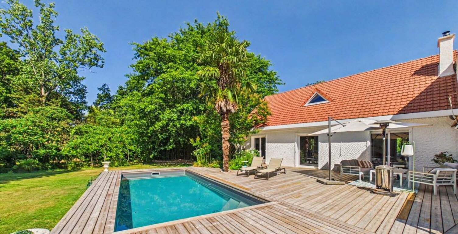 Havre de paix idéal pour votre famille avec jardin en vente à Sautron (44880) — photo 1